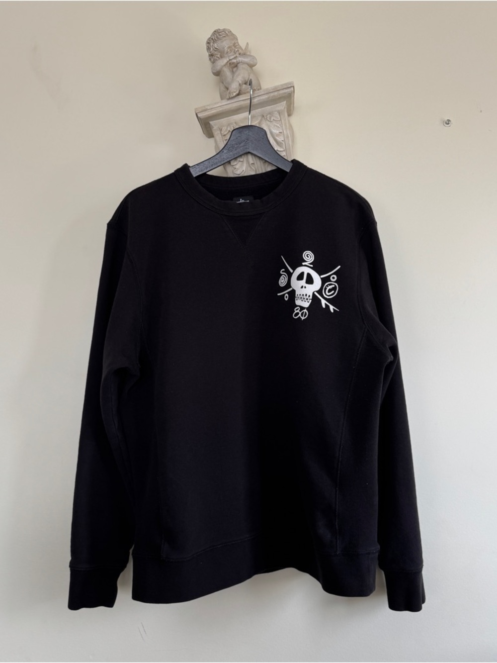 Vintage Y2K Stussy Black Crewneck Sweater with White Skull Graphic